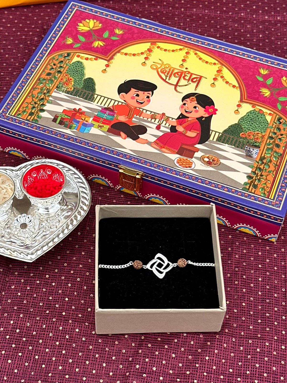Sacred Silver Rakhis - The Aarna Jewels