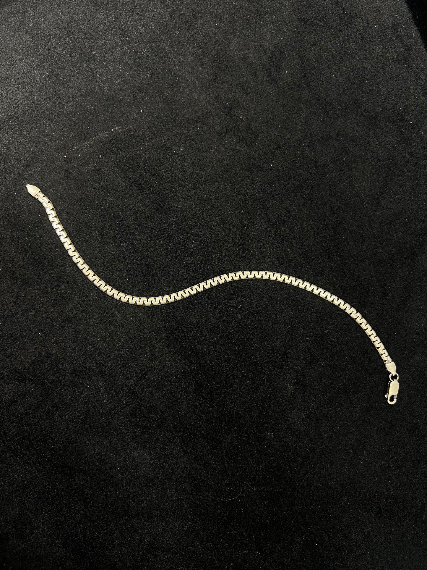 Gold chain on a black background