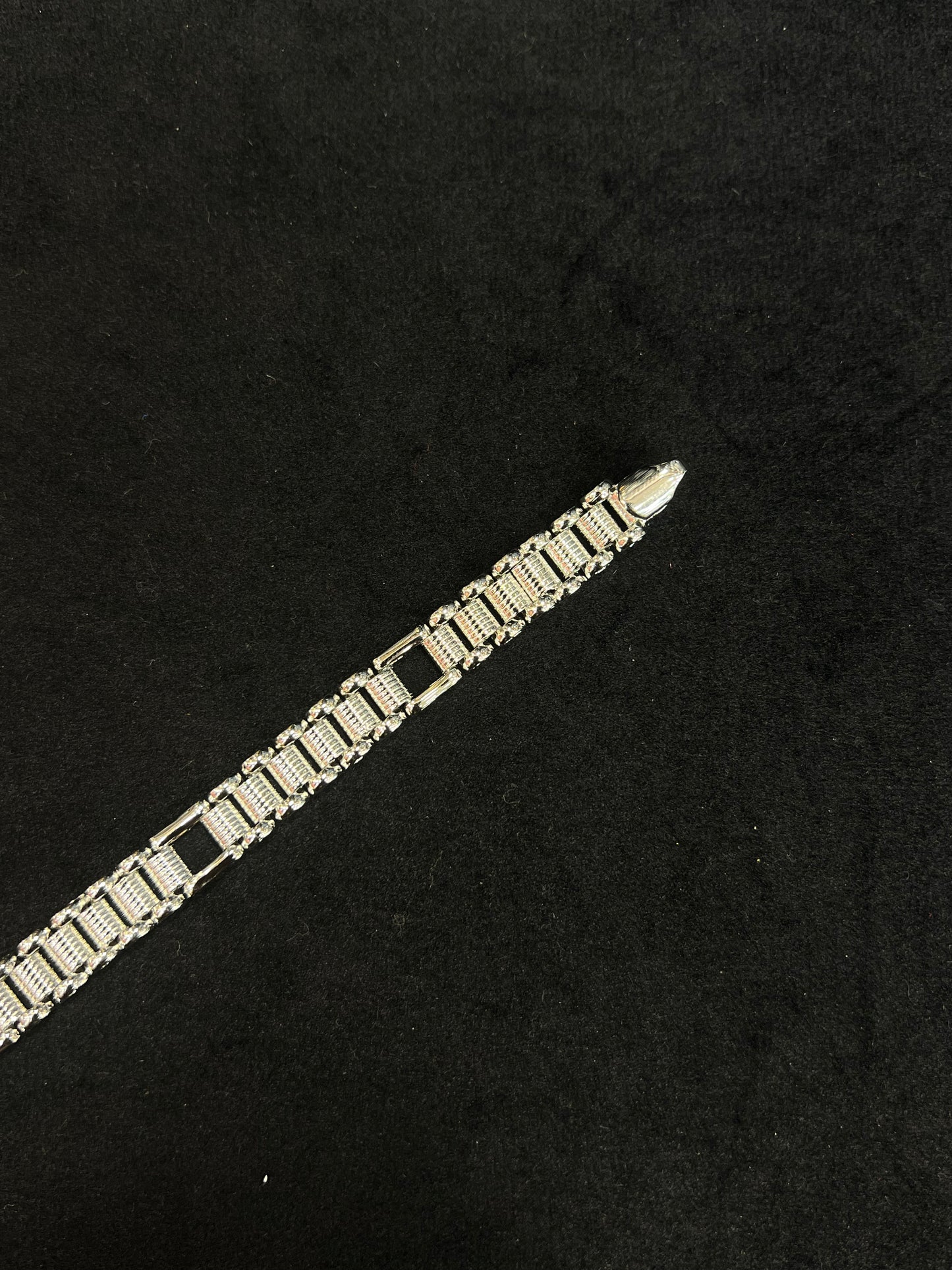 Gold bracelet on a black background