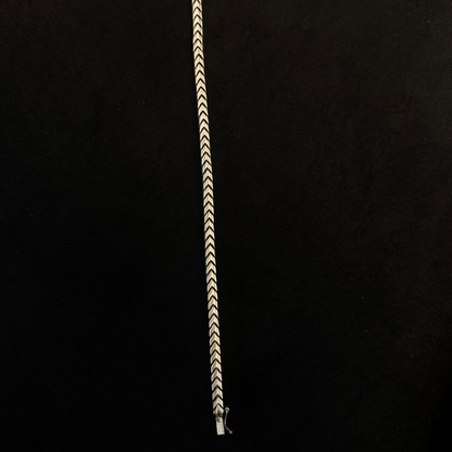 Bracelet with a zigzag pattern on a black background