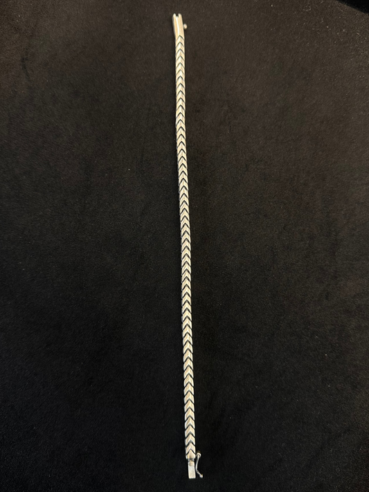 Bracelet with a chevron pattern on a black background