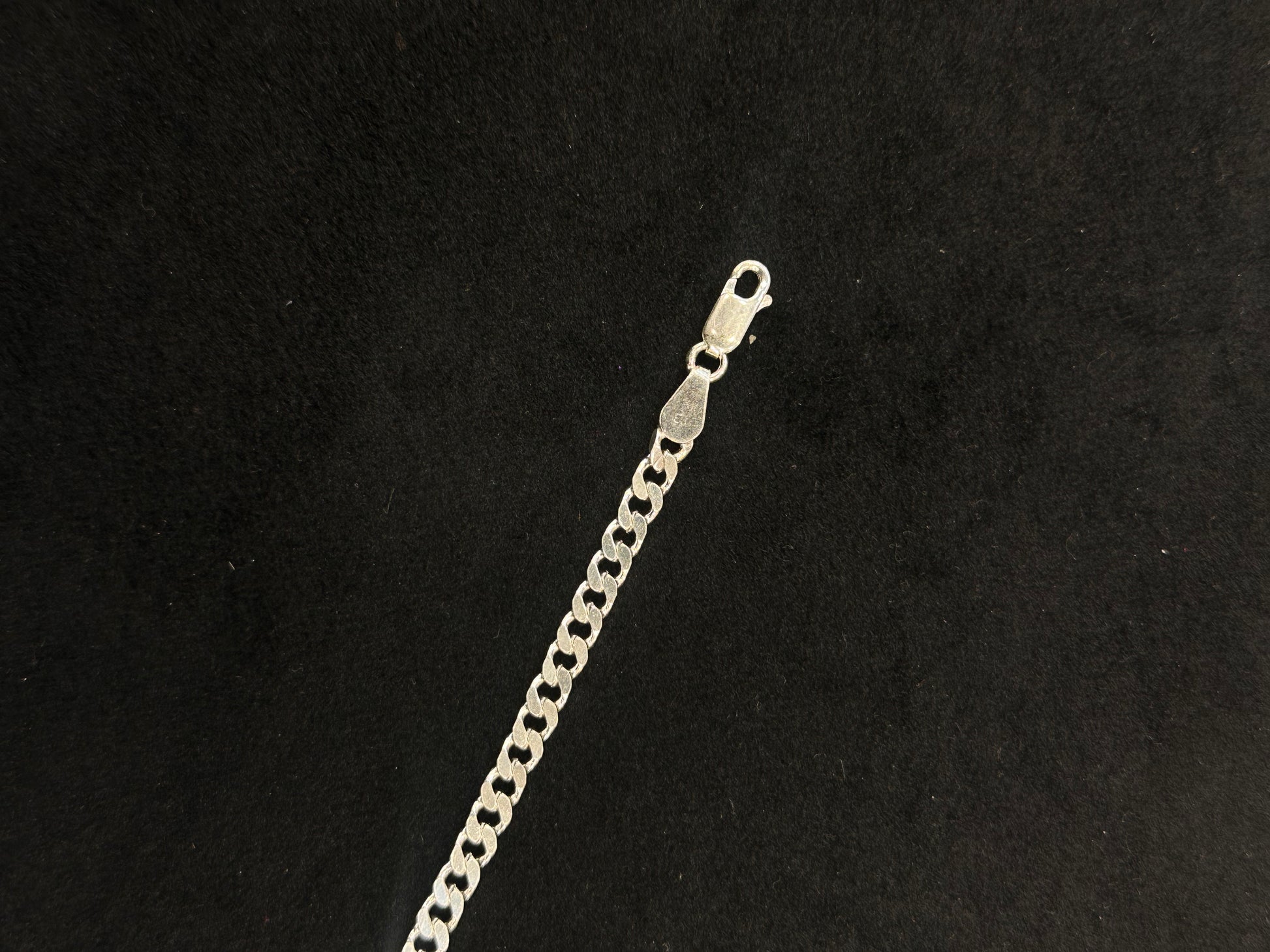 Silver chain on a black background