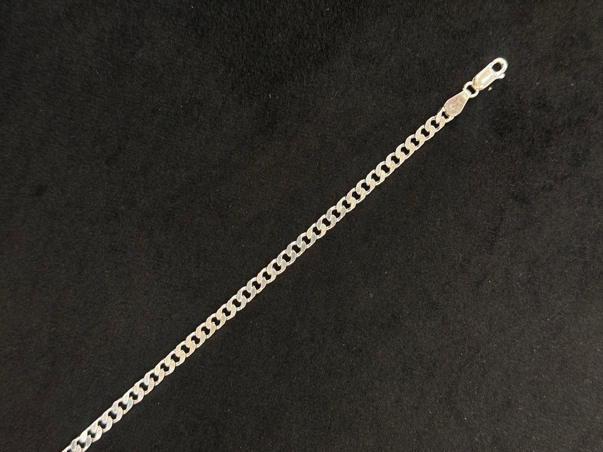 Gold chain on a black background