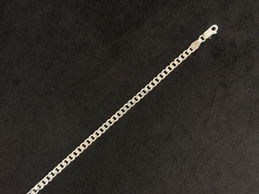 Gold chain on a black background