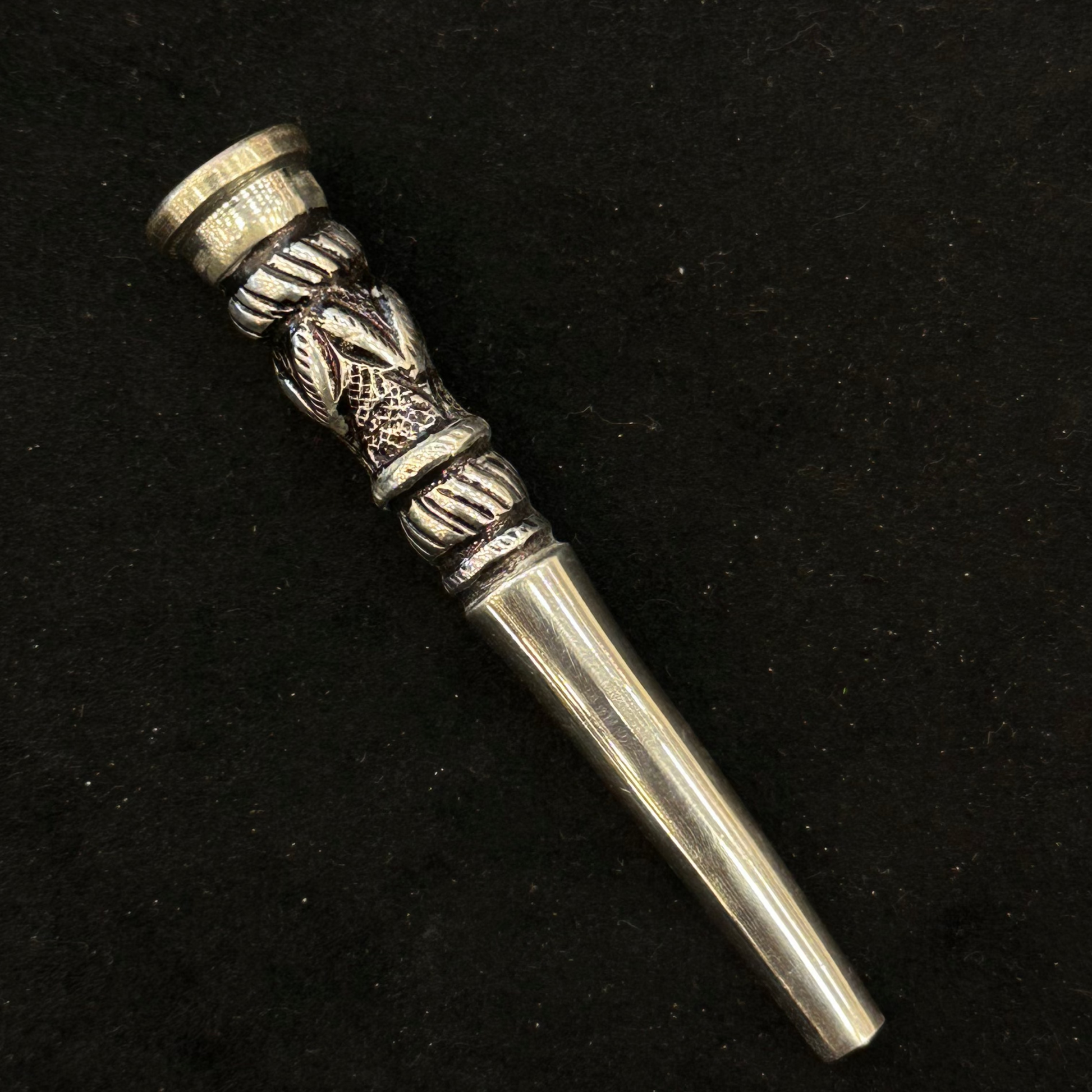 Silver decorative hookah  on a black background