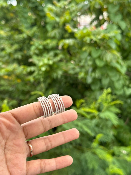 Crescent Weave Silver Hoop Earrings - The Aarna Jewels